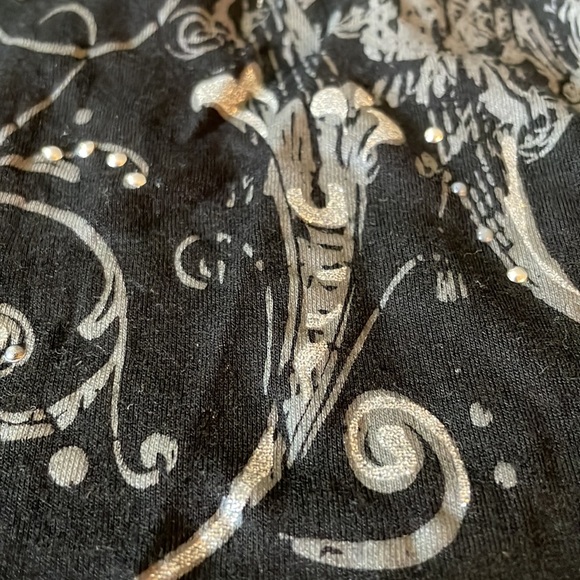 Black shirt. With straps that criss cross in the back. Sz small - Picture 7 of 7